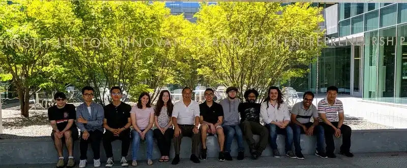 Team outdoors on campus, 2019