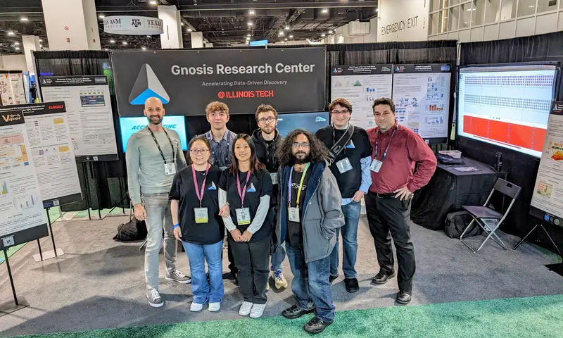 The GRC team at the center's research booth at SC23